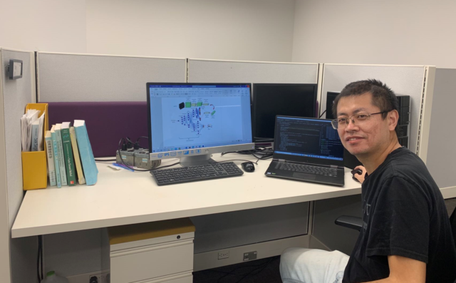 Researcher working at his desk.