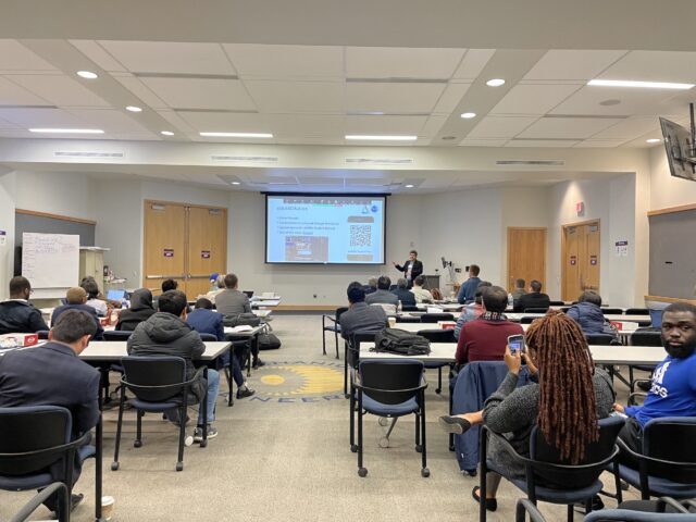 Student speaks to the conference attendees.