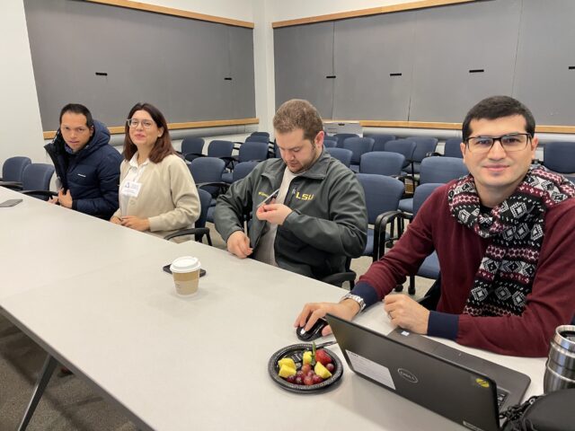 Four students at a table.